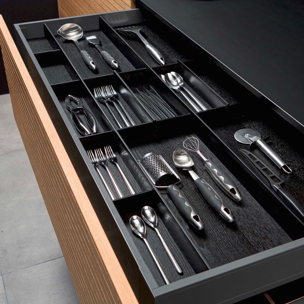 kitchen drawer for forks and knives and spoons and other kitchen tools that make your life easier